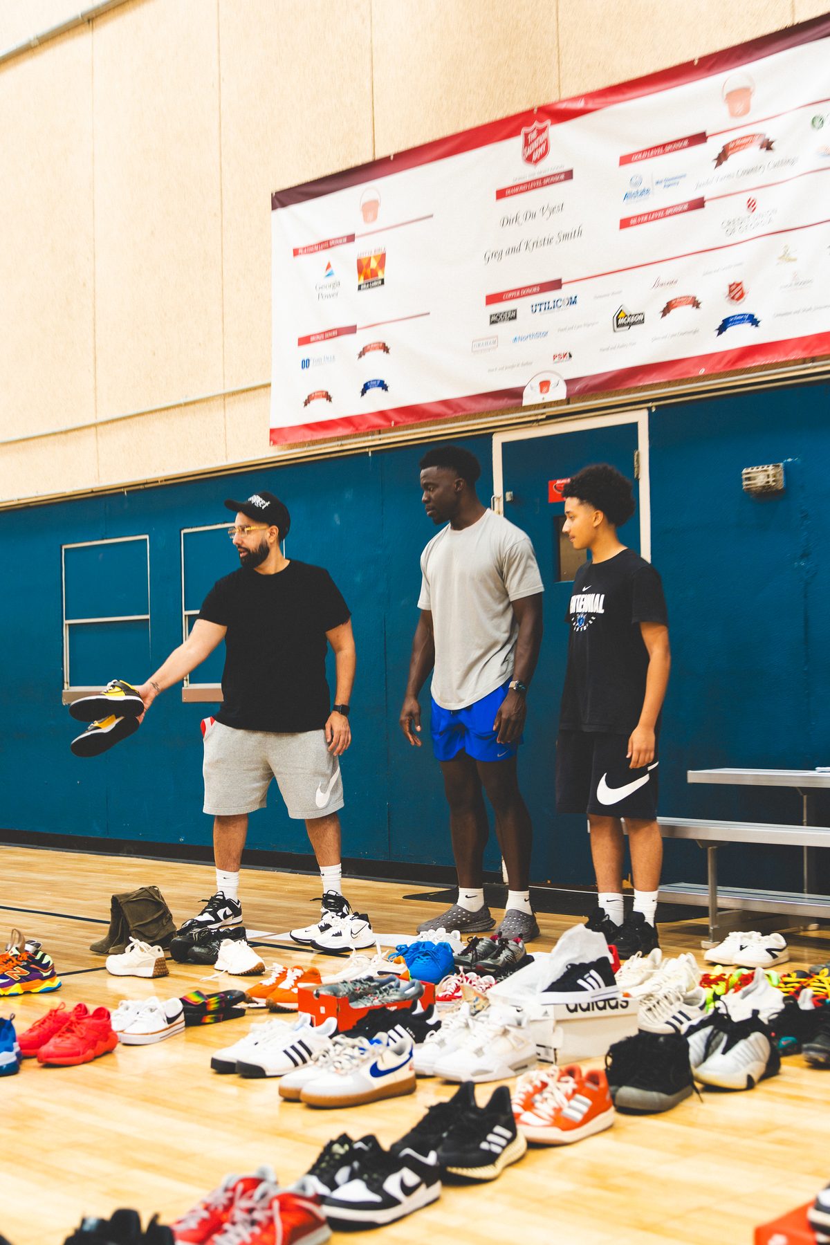 Sevenity Sports Group shoe drive with kids at the Marietta Community Center