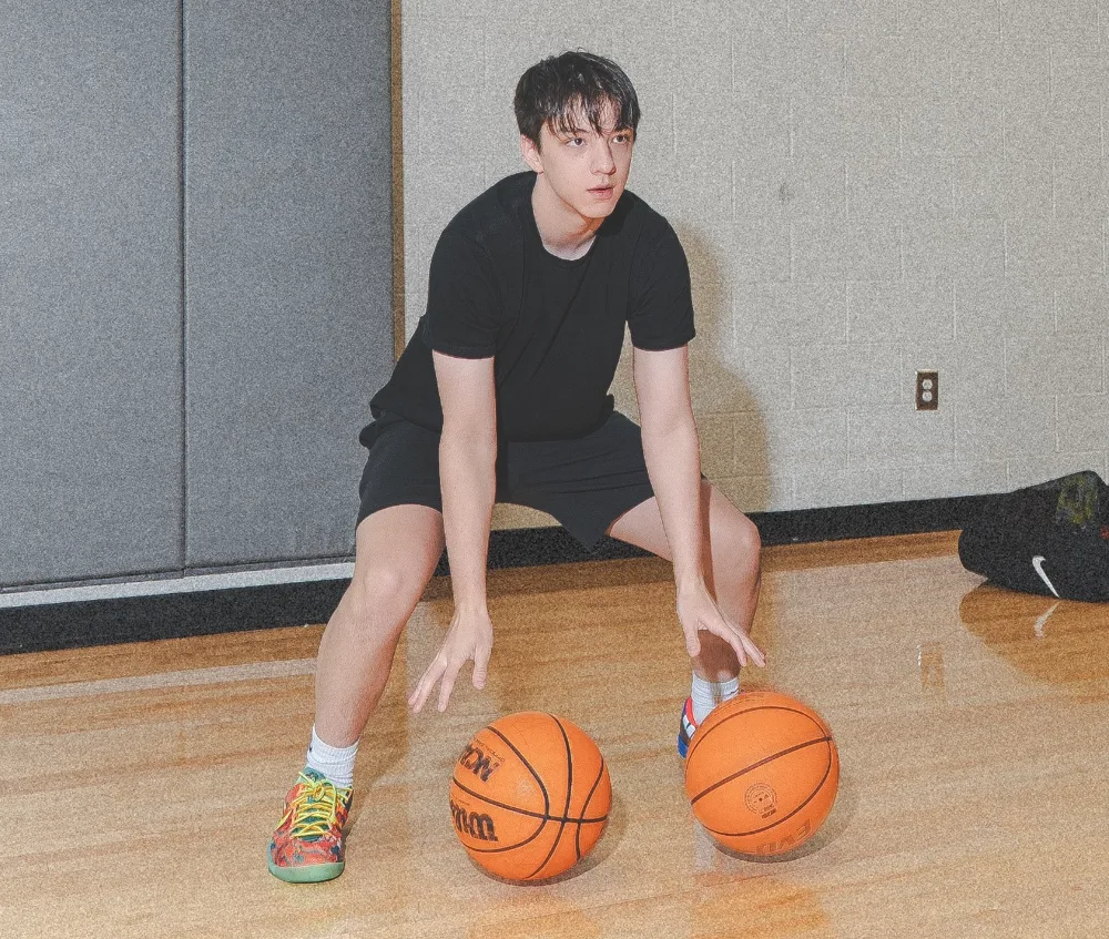 Player working on a two ball dribbling drill